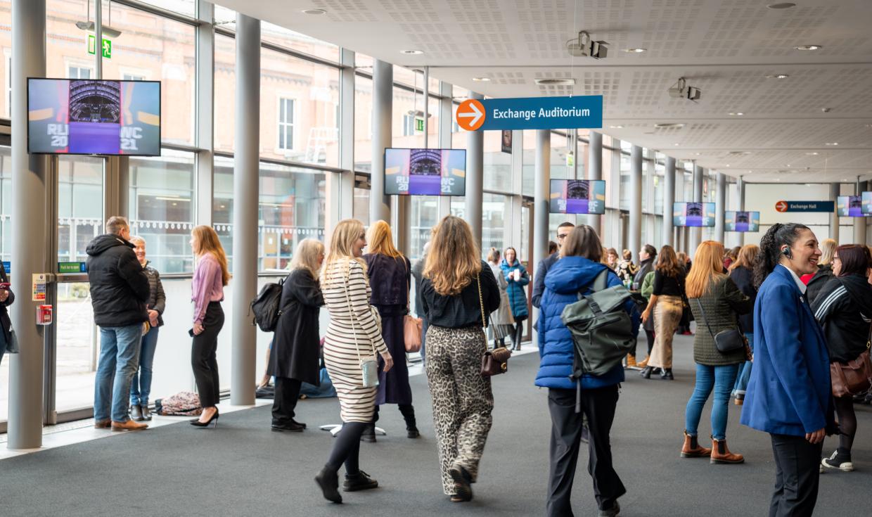 Crowds moving through Exchange Upper Foyer